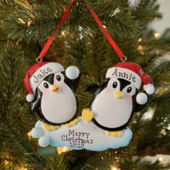 Penguin Couple Throwing Snowballs Personalized Christmas Ornament OR1318 -The Jelly Christmas Shop api5rhvis 93096.1646091889